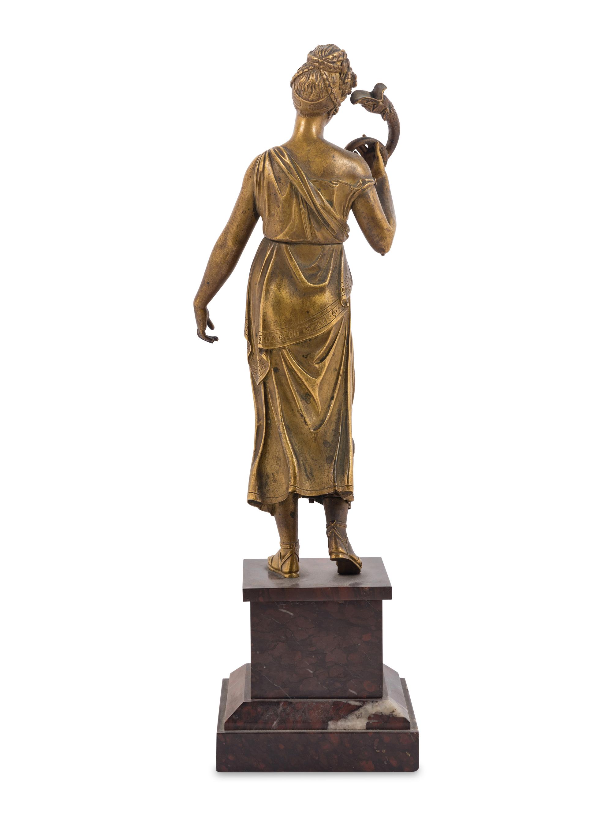 A Continental Gilt Bronze and Marble Figure of a Lady
