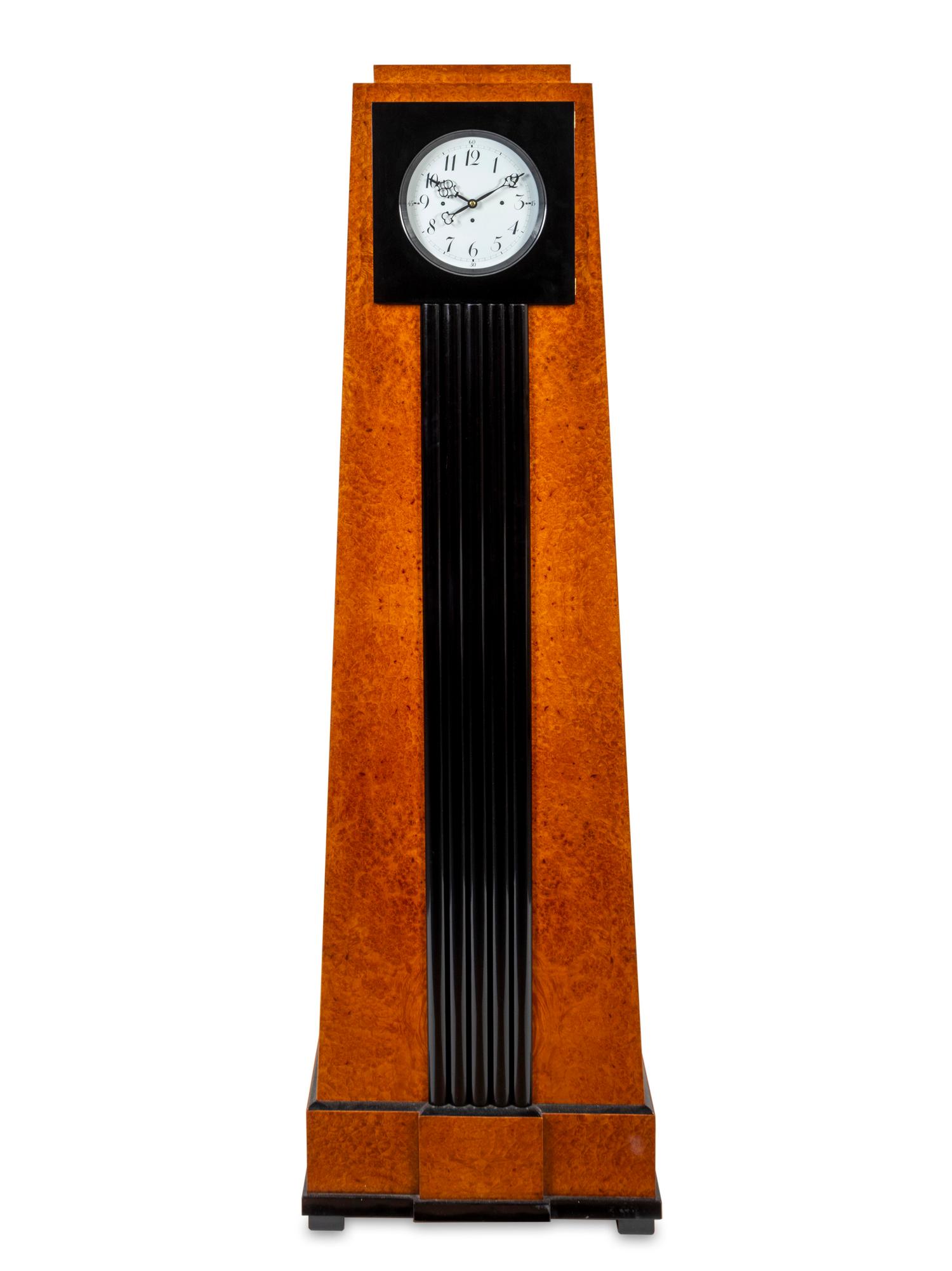A Biedermeier Style Amboyna-Veneered Longcase Clock — 20TH CENTURY