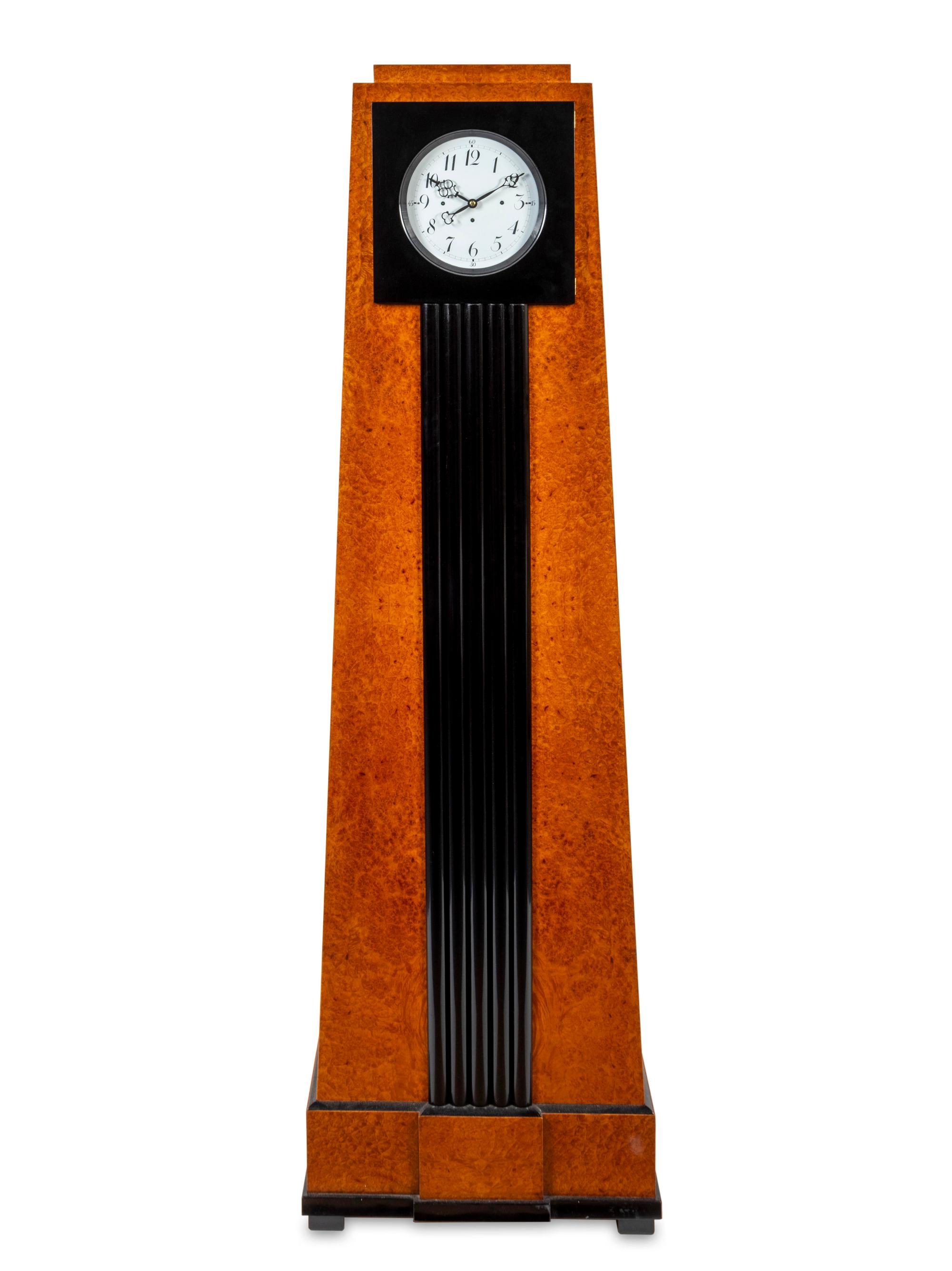 A Biedermeier Style Amboyna-Veneered Longcase Clock — 20TH CENTURY