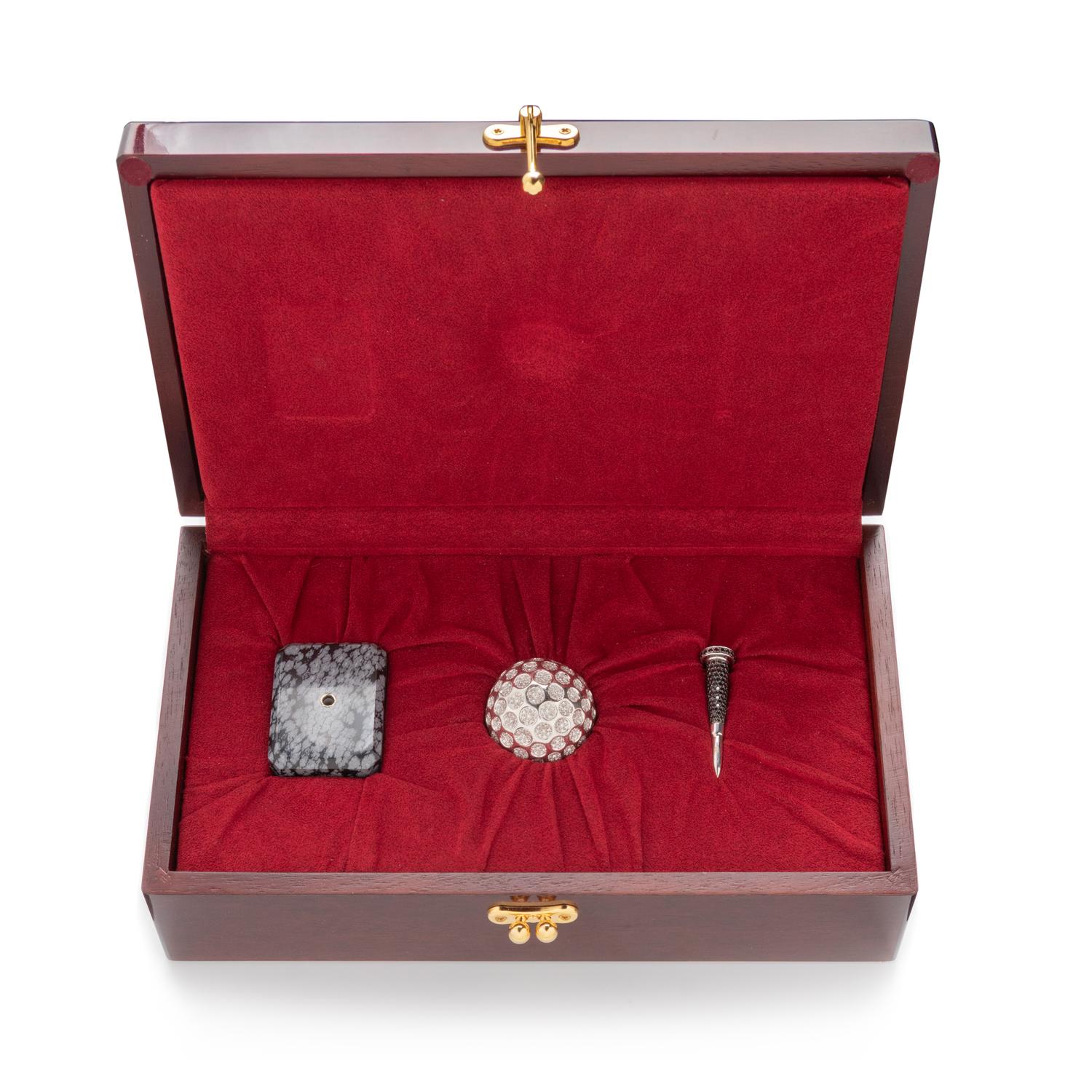 CHARLES HOLLANDER, WHITE GOLD, DIAMOND, AND BLACK DIAMOND PRESENTATION GOLF BALL AND TEE