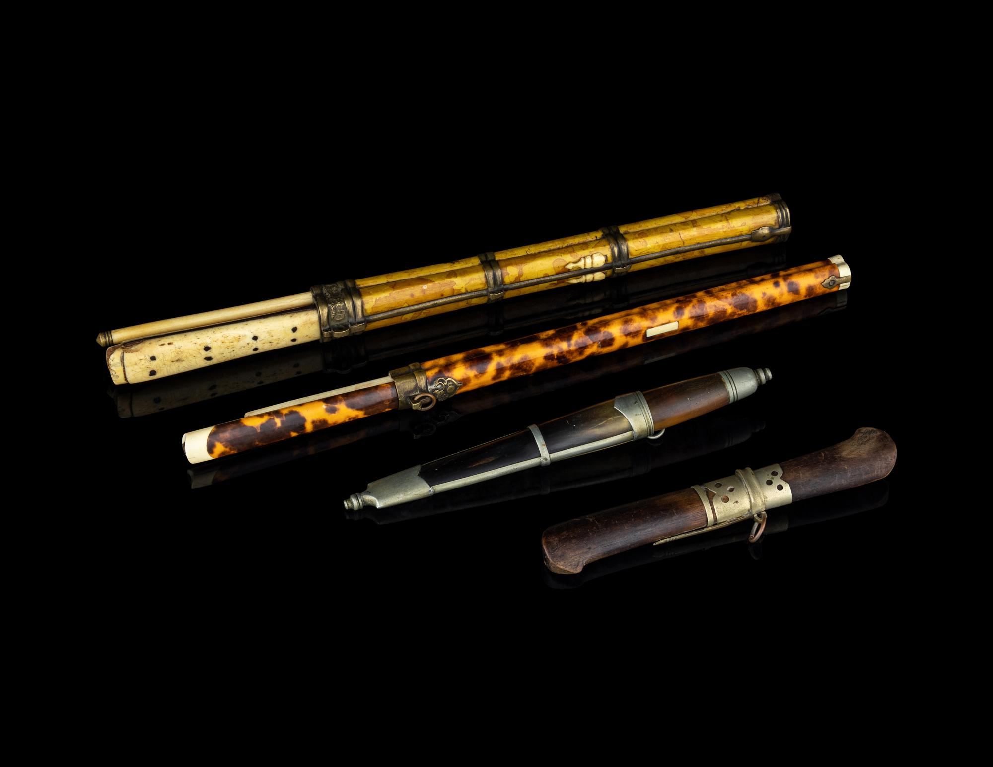 A Collection of Four Chopsticks and Knife Sets