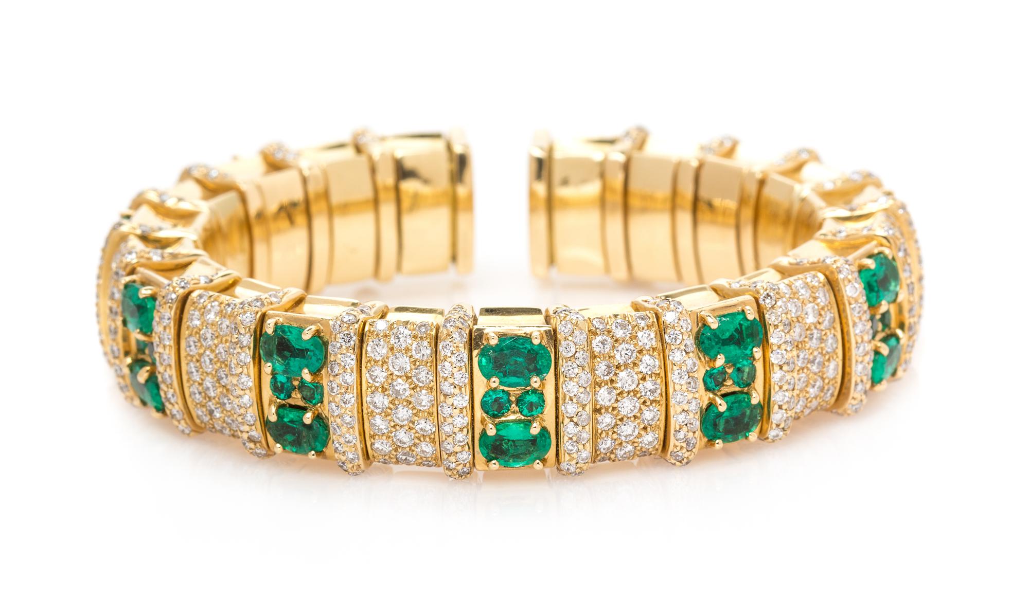 An 18 Karat Yellow Gold, Emerald and Diamond Flexible Cuff Bracelet, 65.65 dwts.