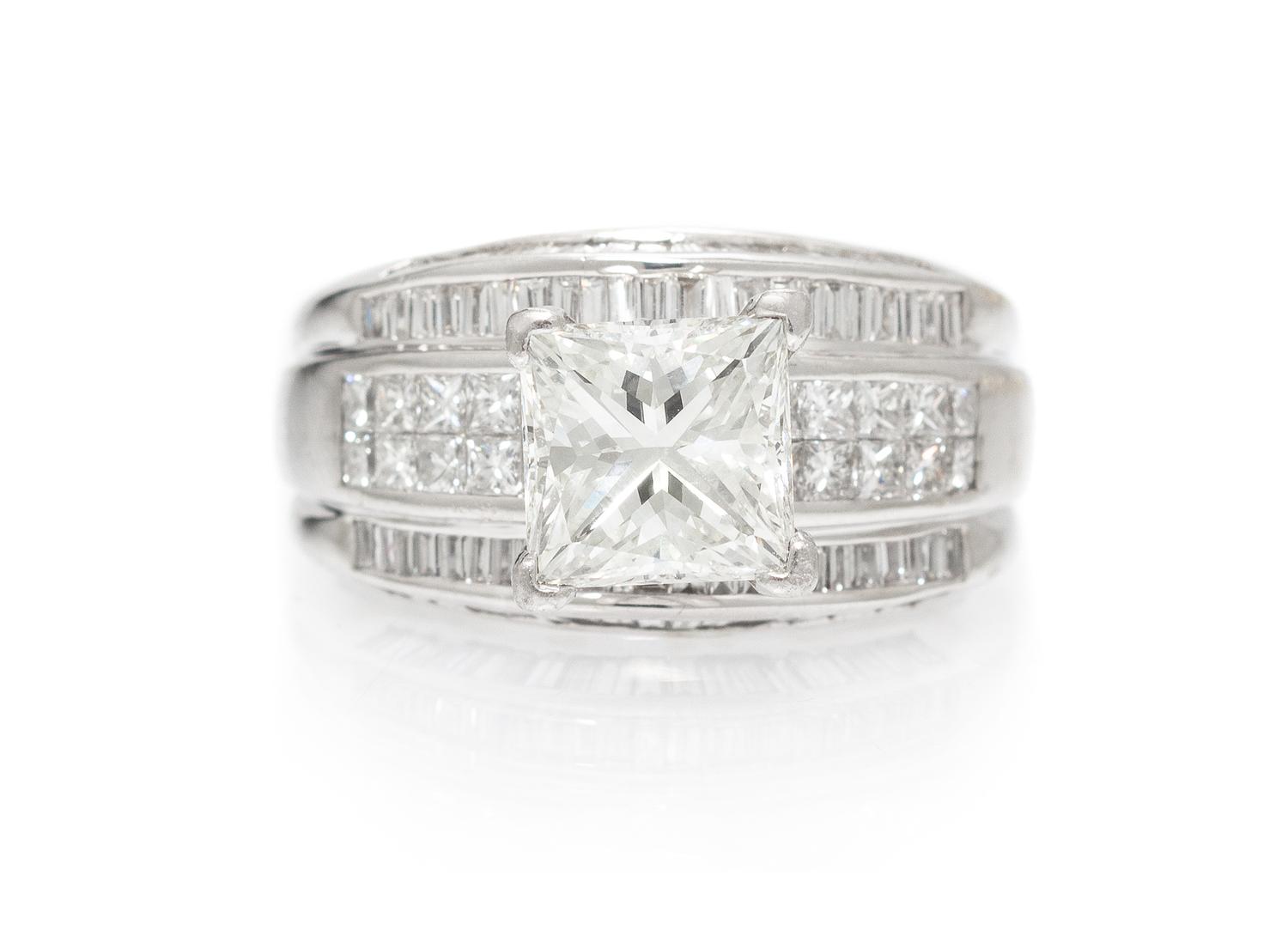 An 18 Karat White Gold, Platinum and Diamond Ring, 9.10 dwts.