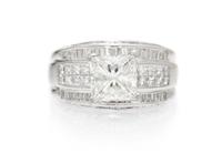 An 18 Karat White Gold, Platinum and Diamond Ring, 9.10 dwts.