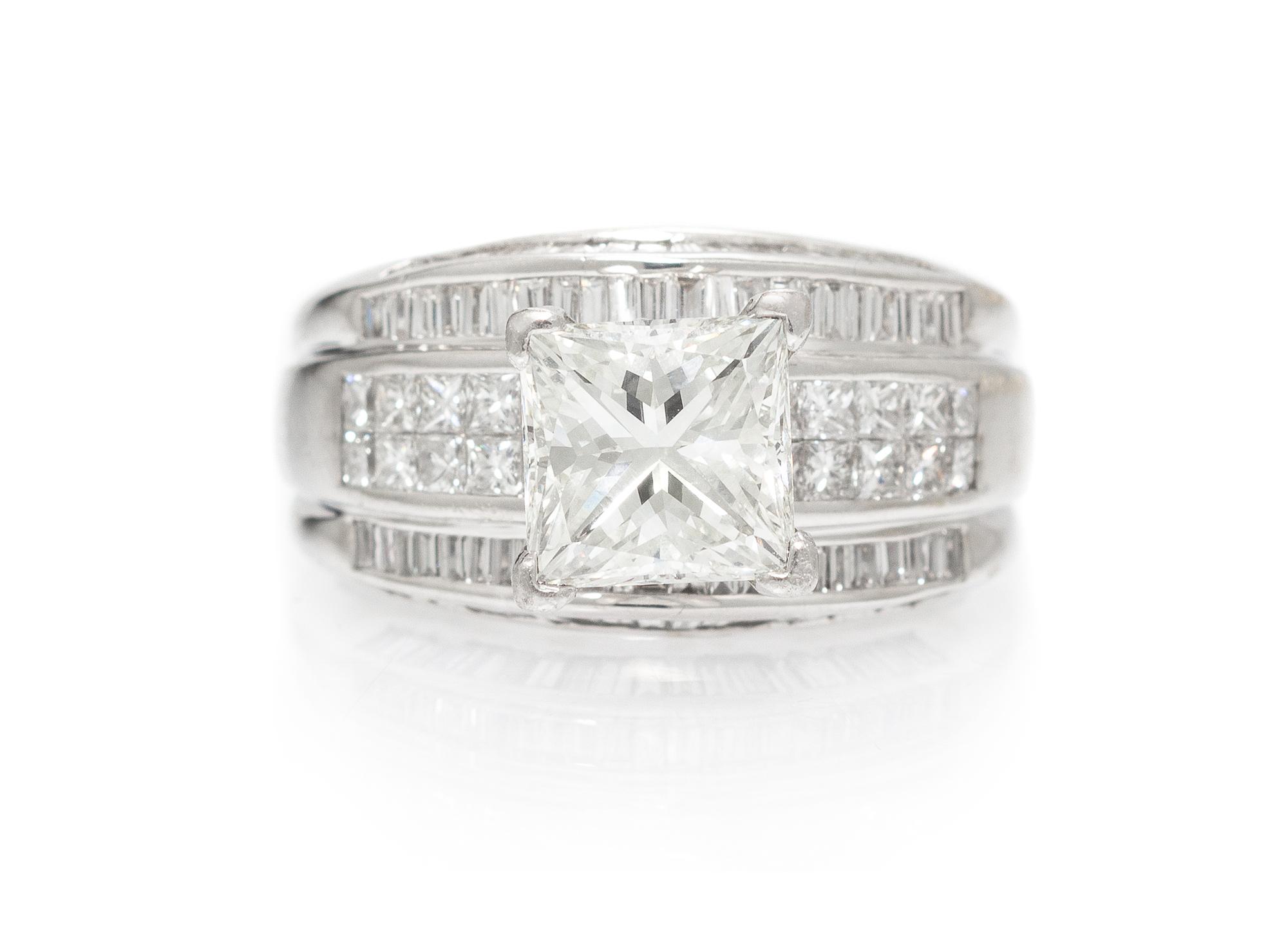 An 18 Karat White Gold, Platinum and Diamond Ring, 9.10 dwts.