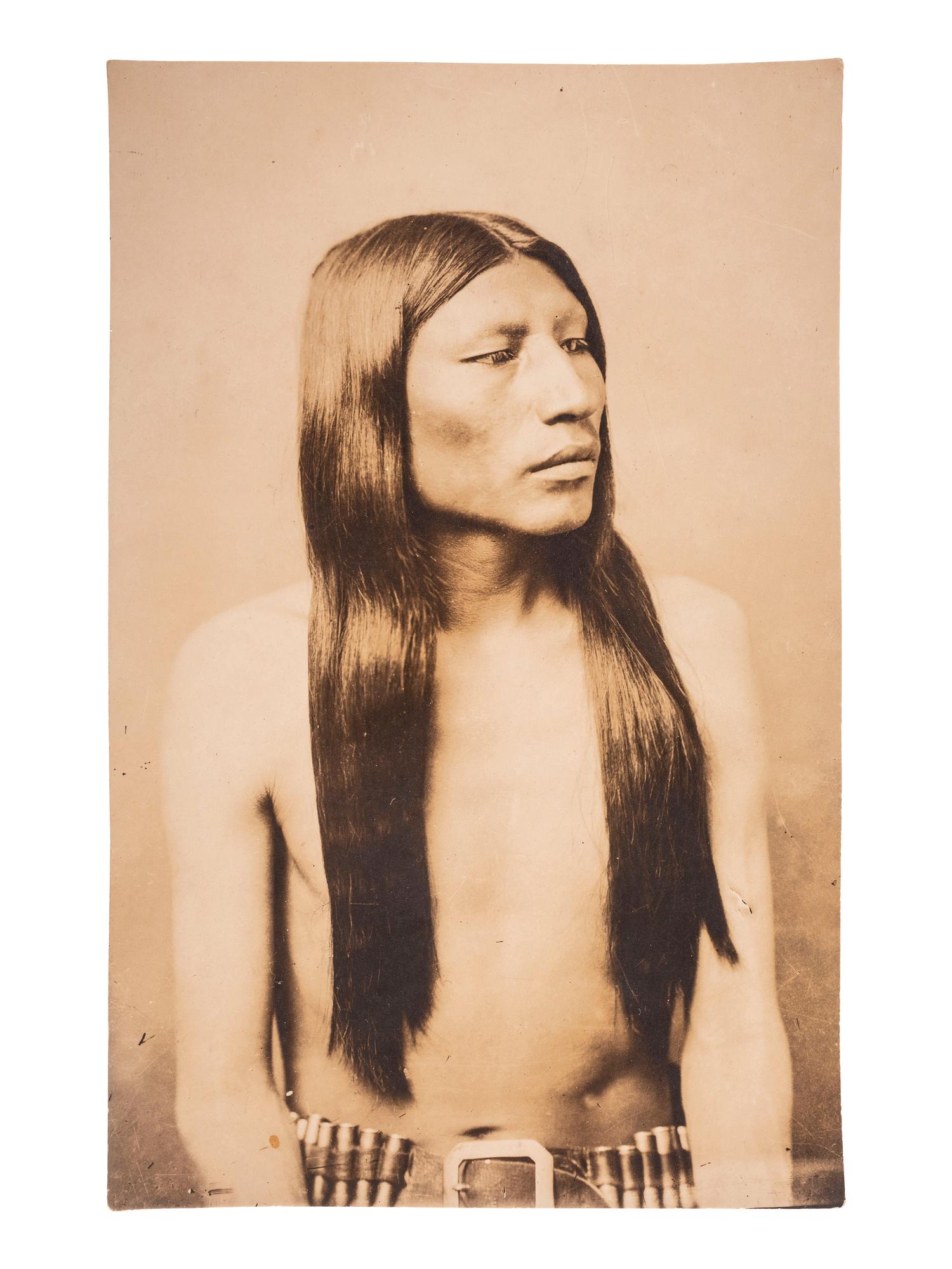 [NATIVE AMERICANS]. [BAKER & JOHNSTON, photographers]. Photograph of a Shoshone warrior. [Evanston, Wyoming: ca 1880s].