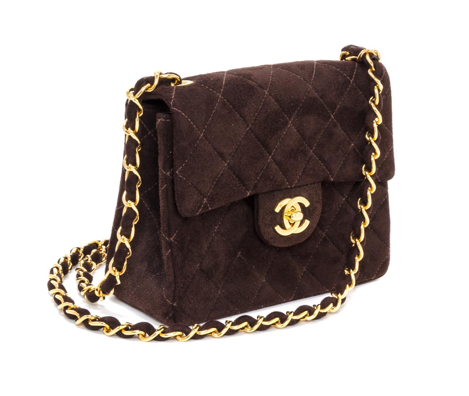 A Chanel Brown Suede Quilted Mini Flap Bag, 6.5" x 5" x 2.5".