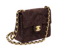A Chanel Brown Suede Quilted Mini Flap Bag, 6.5" x 5" x 2.5".