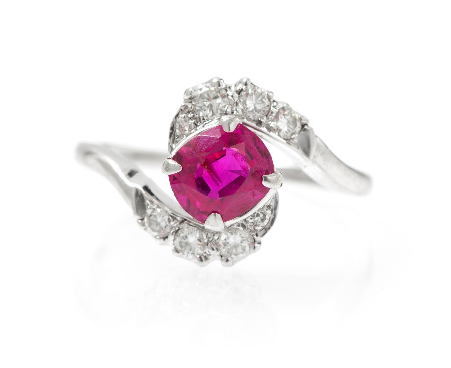 An 18 Karat White Gold, Ruby and Diamond Ring, 2.10 dwts.