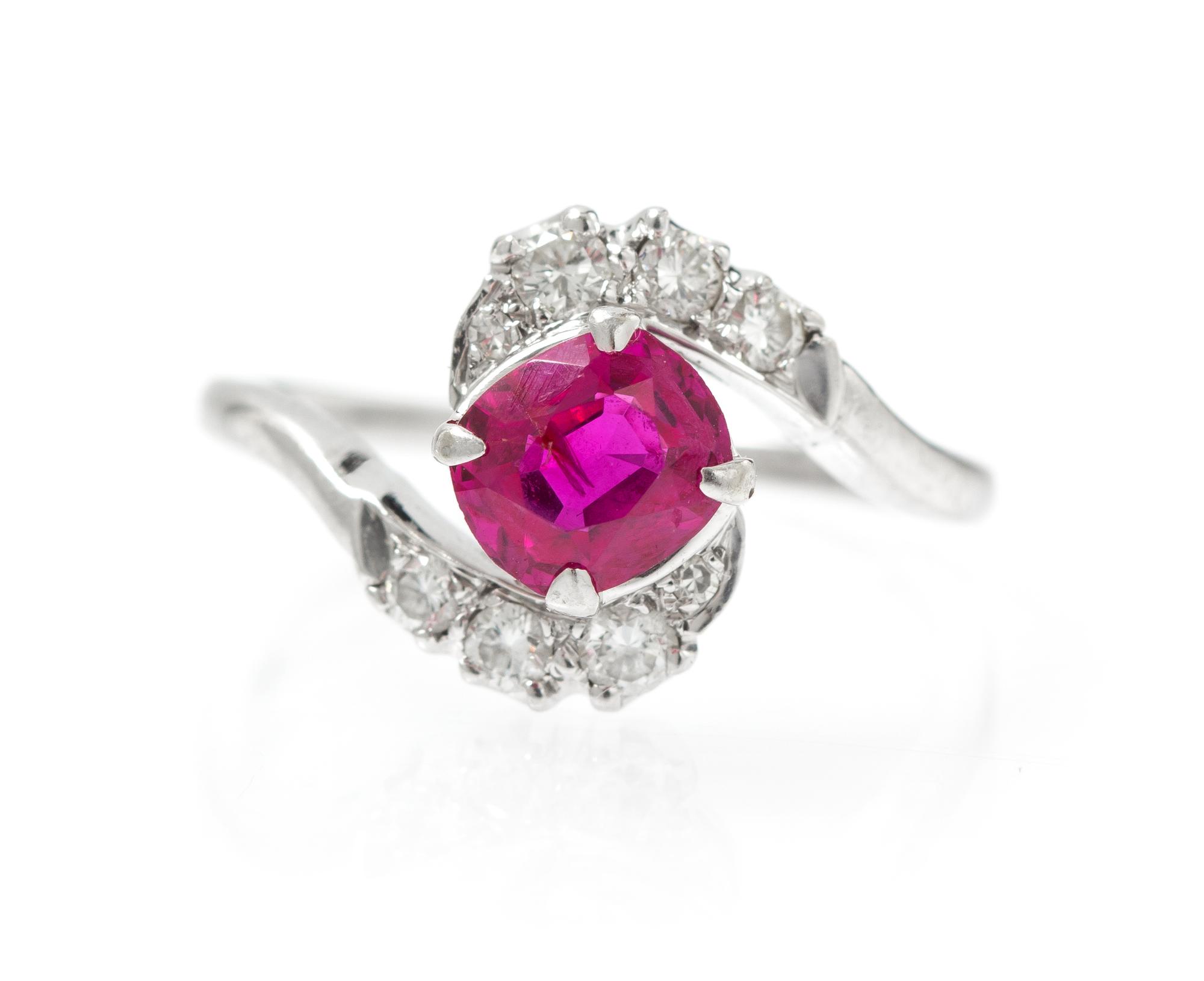 An 18 Karat White Gold, Ruby and Diamond Ring, 2.10 dwts.