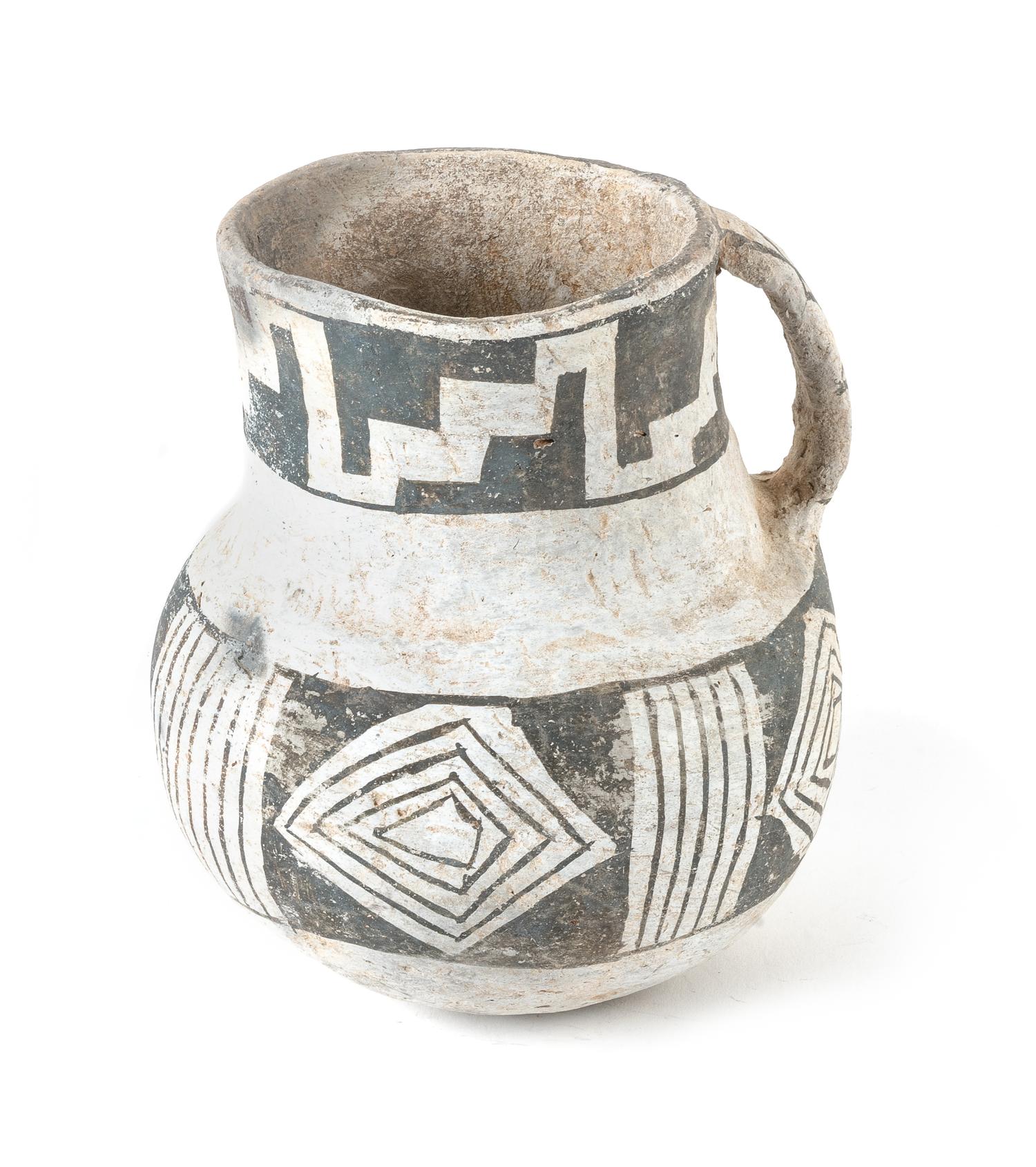 Prehistoric Black on White Pitcher 6 inches