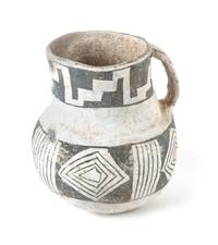 Prehistoric Black on White Pitcher 6 inches