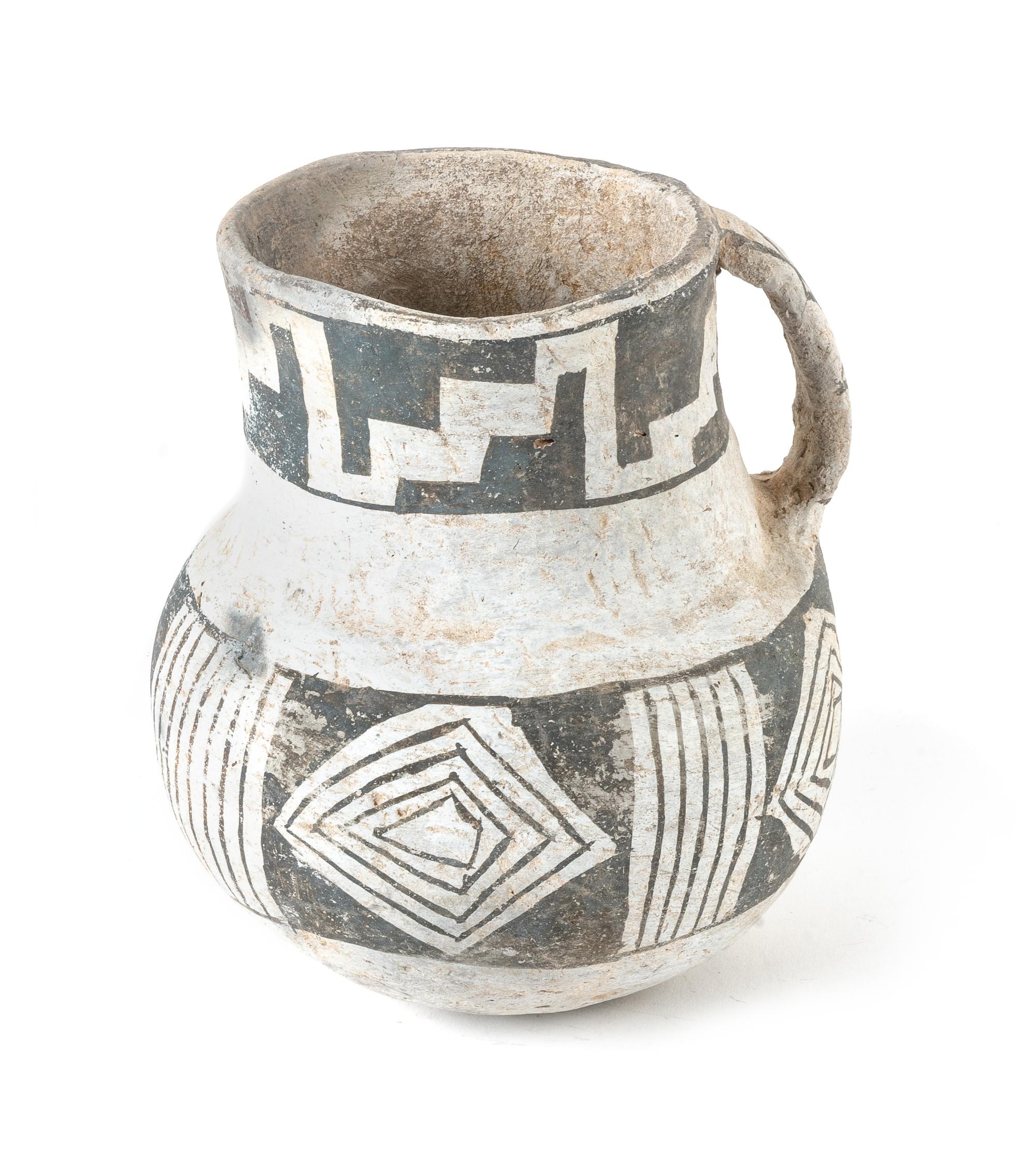 Prehistoric Black on White Pitcher 6 inches