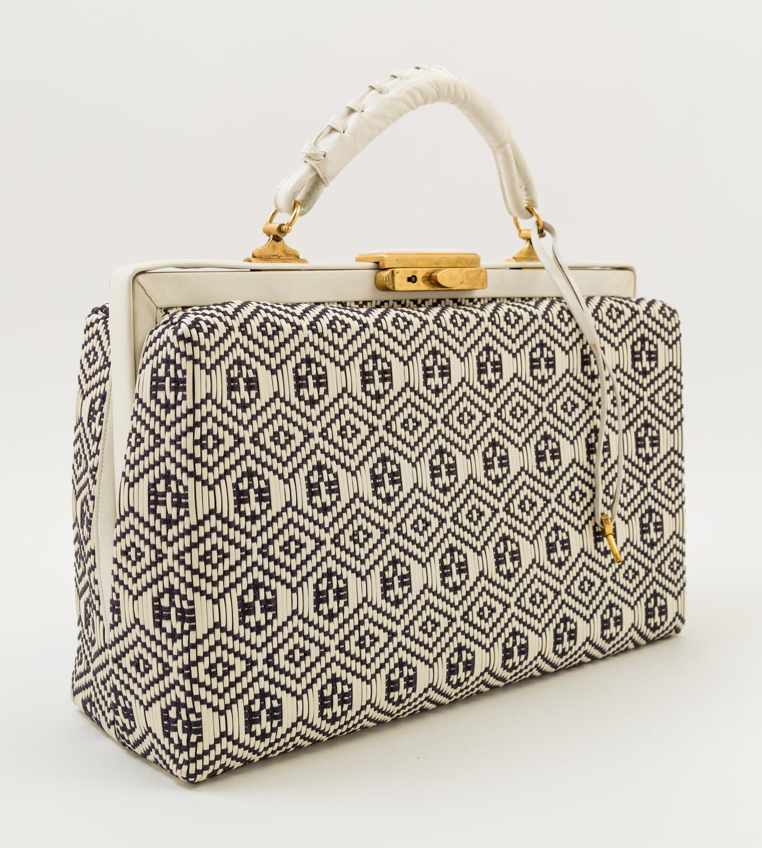 A Roberta Di Camerino Cream and Black Woven Structured Handbag, 14" x 9.5" x 5"; Handle drop: 3".