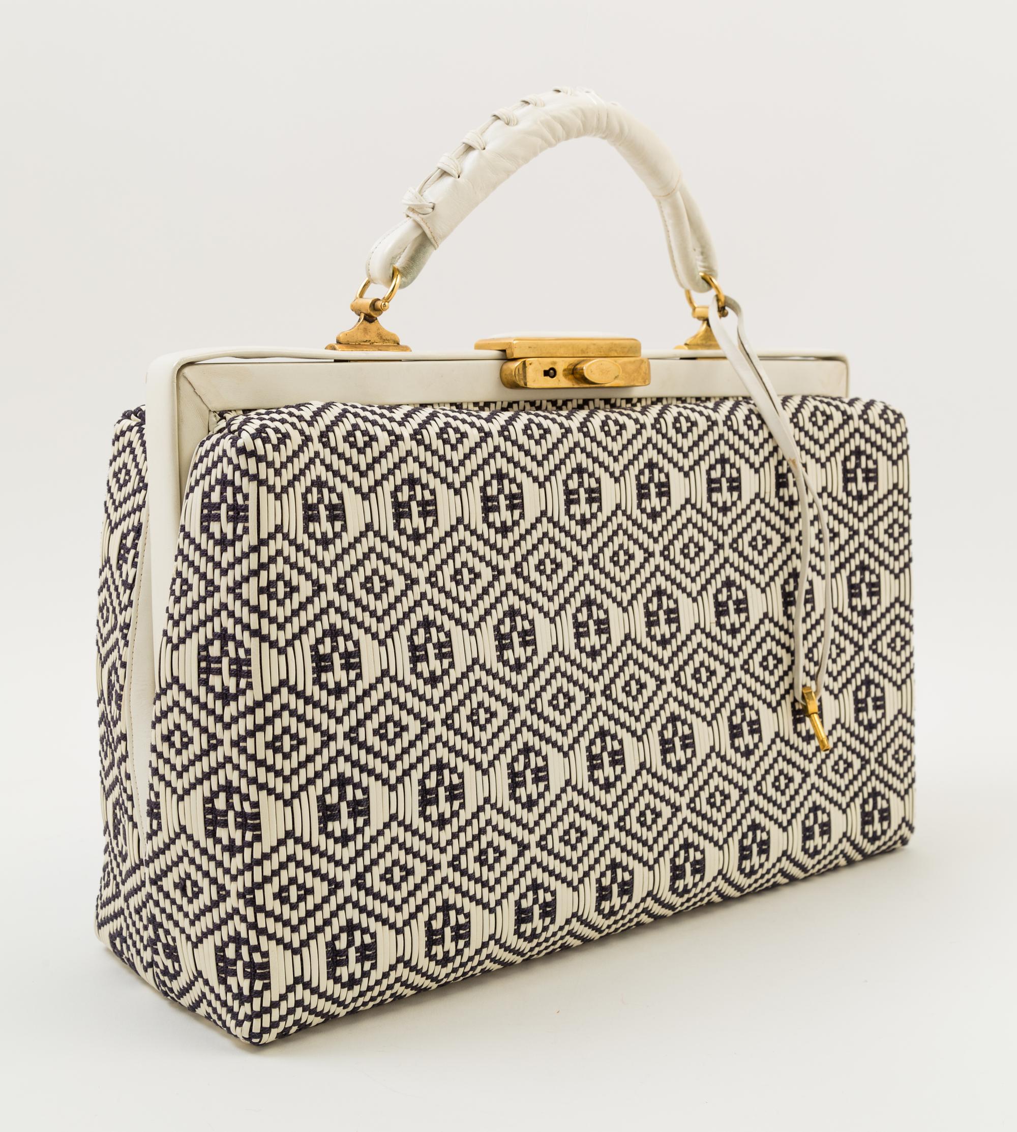 A Roberta Di Camerino Cream and Black Woven Structured Handbag, 14" x 9.5" x 5"; Handle drop: 3".