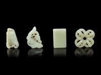 Four Chinese Pale Celadon Jade Pendants