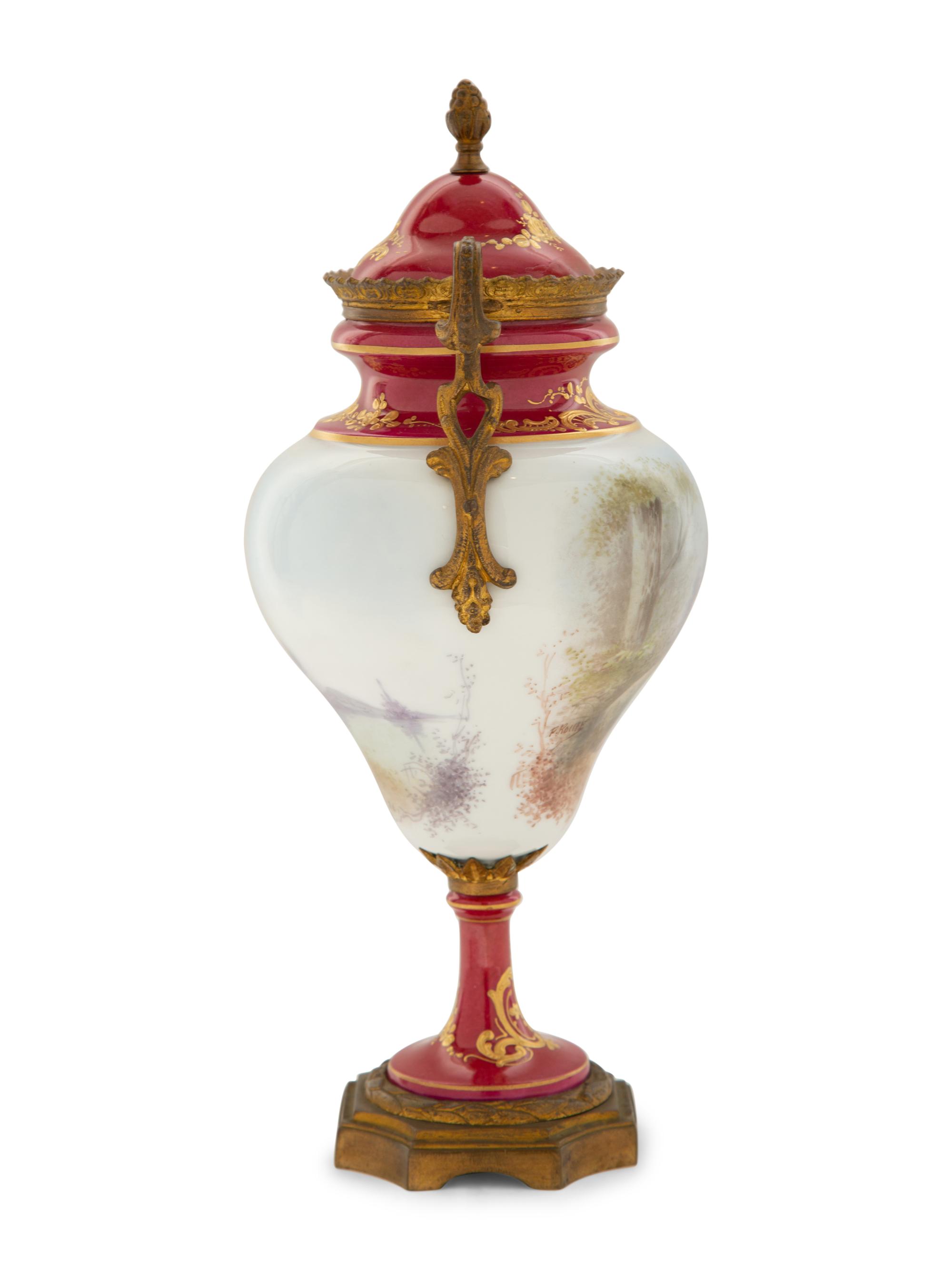 A Gilt Metal Mounted Sèvres Style Porcelain Urn