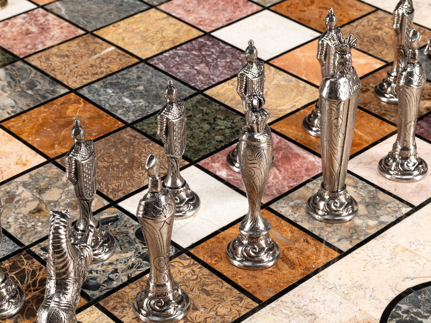 A Continental Parcel Gilt Specimen Marble Game Table