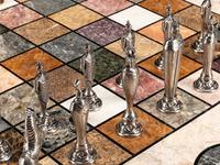A Continental Parcel Gilt Specimen Marble Game Table