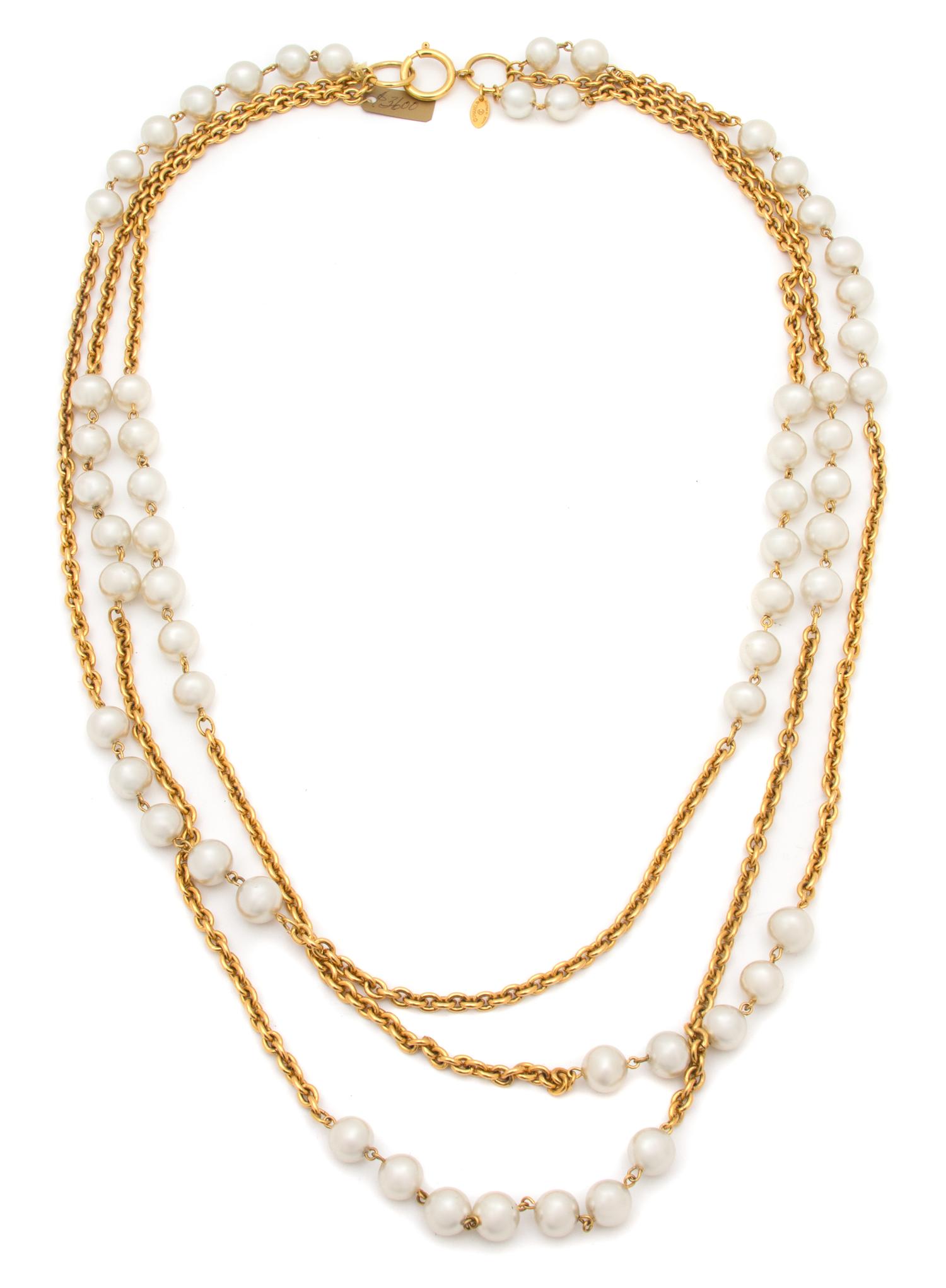 A Chanel Goldtone and Faux Pearl Triple Strand Necklace, Shortest strand: 34".