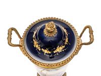 A Pair of Sèvres Style Gilt Bronze-Mounted Porcelain Urns