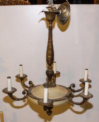 A Neoclassical Brass Six-Light Chandelier Height 31 1/4 inches (overall).