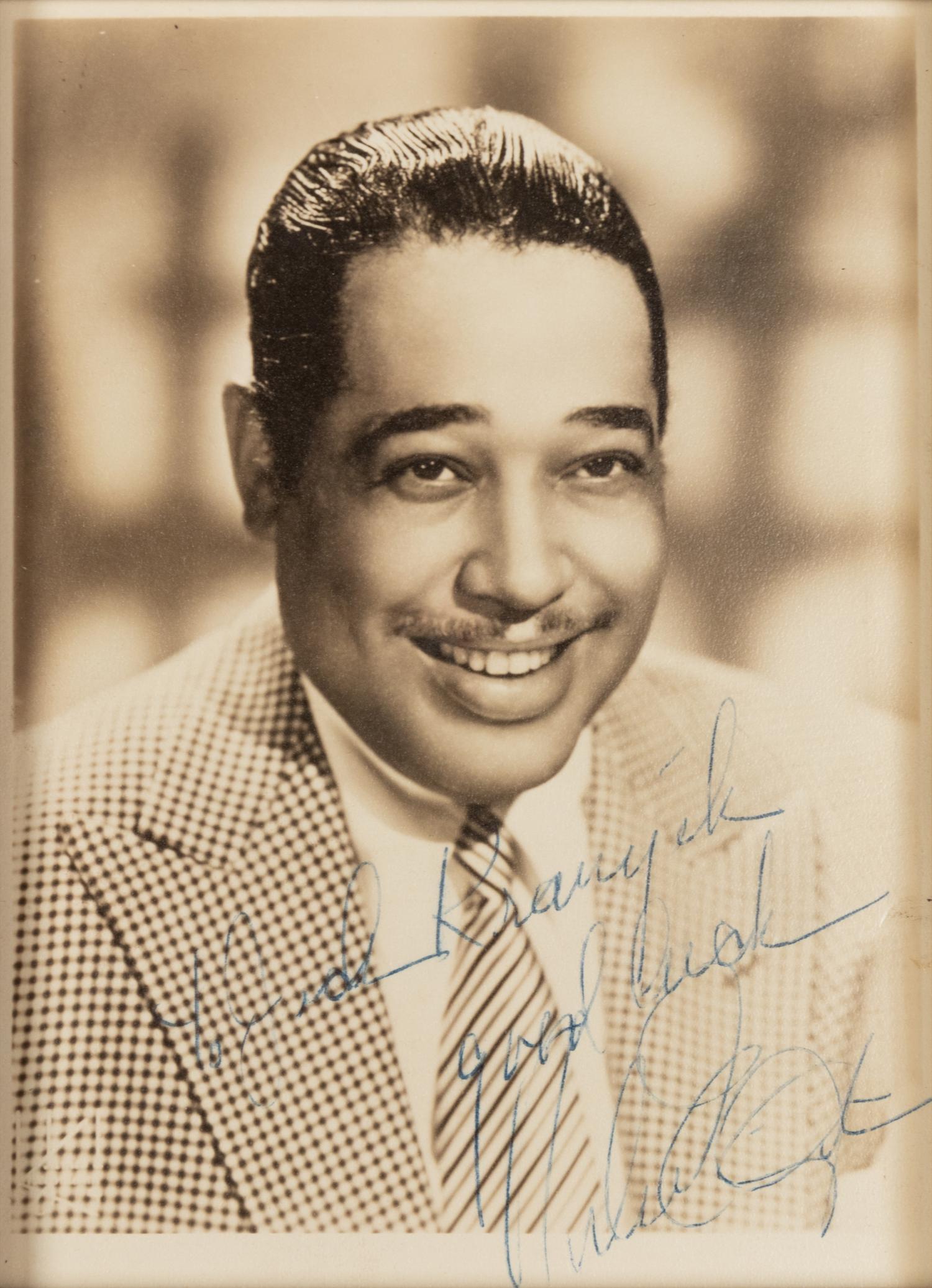 ELLINGTON, Duke (1899-1974). Black and white photographic portrait, signed (“Duke Ellington”) and additionally inscribed to Jack Kranyik, n.d.