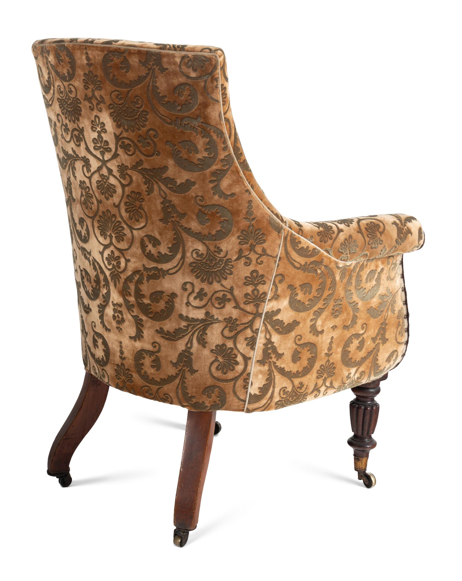 A Pair of William IV Carved Walnut Library Armchairs