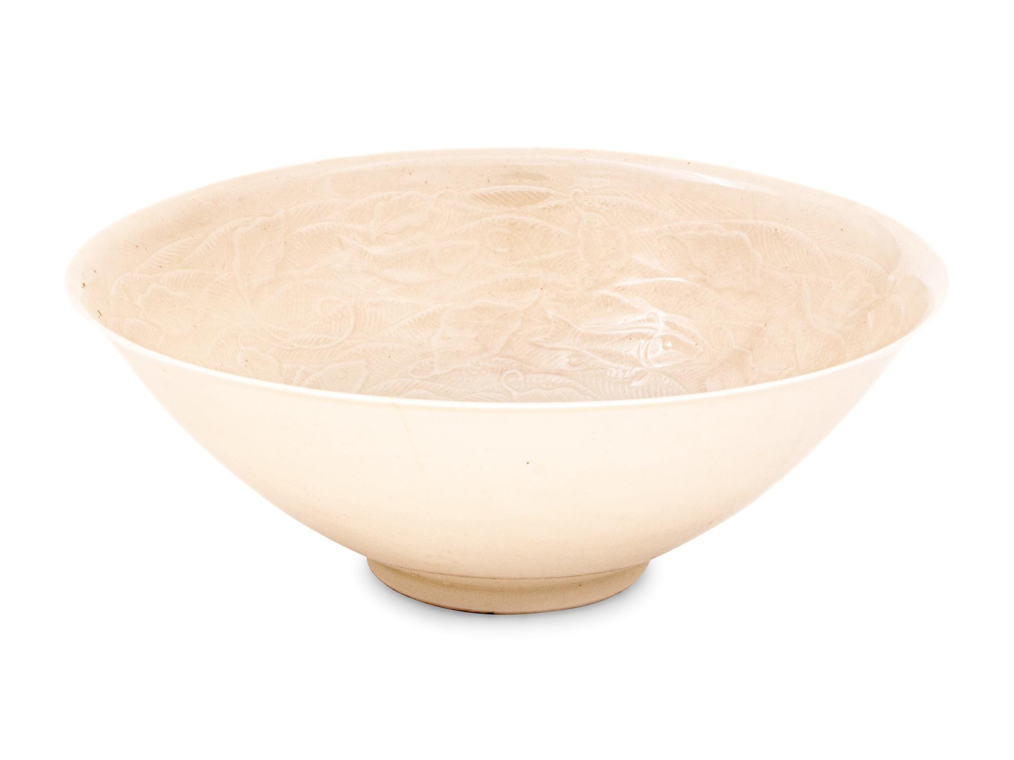 A Japanese White Glazed Molded Bowl