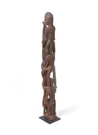 An Asmat Figure COMBINED WITH 31