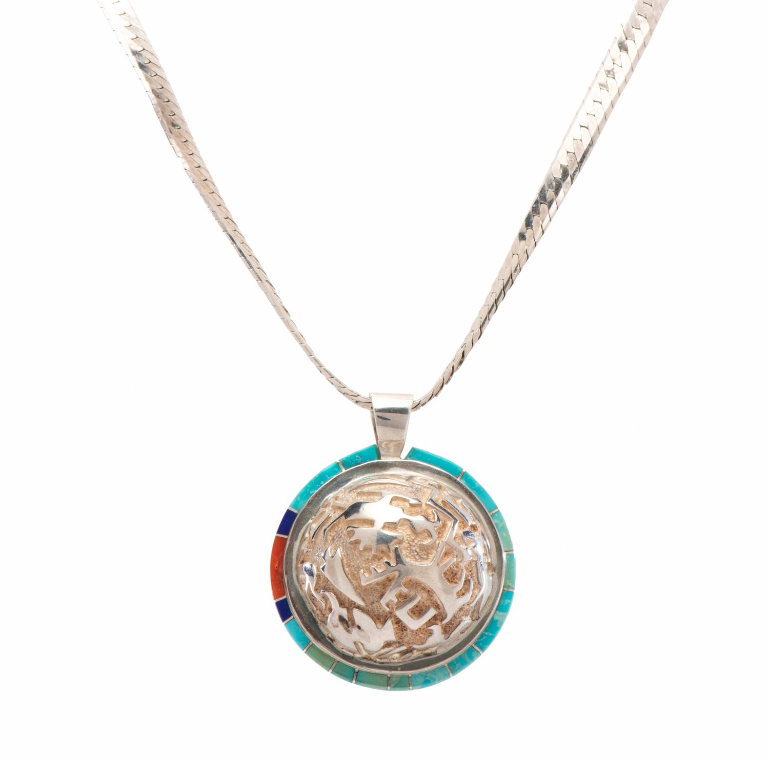 Cast Silver Pendant, with Petroglyph Design and Turquoise, Lapis, and Coral Inlay Lot is located and will ship from Denver, Colorado.