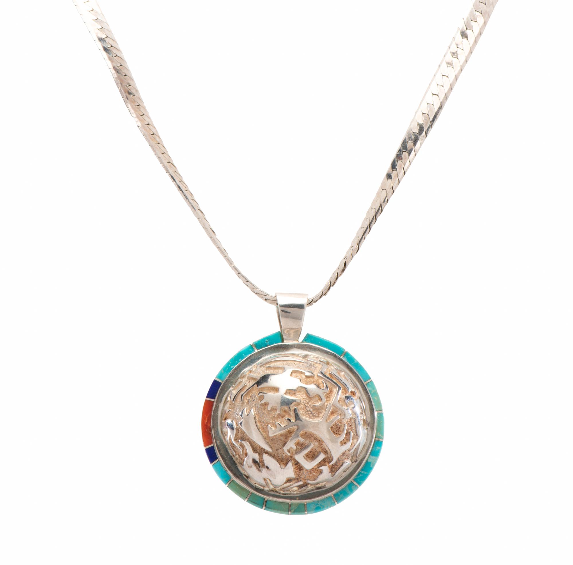 Cast Silver Pendant, with Petroglyph Design and Turquoise, Lapis, and Coral Inlay Lot is located and will ship from Denver, Colorado.