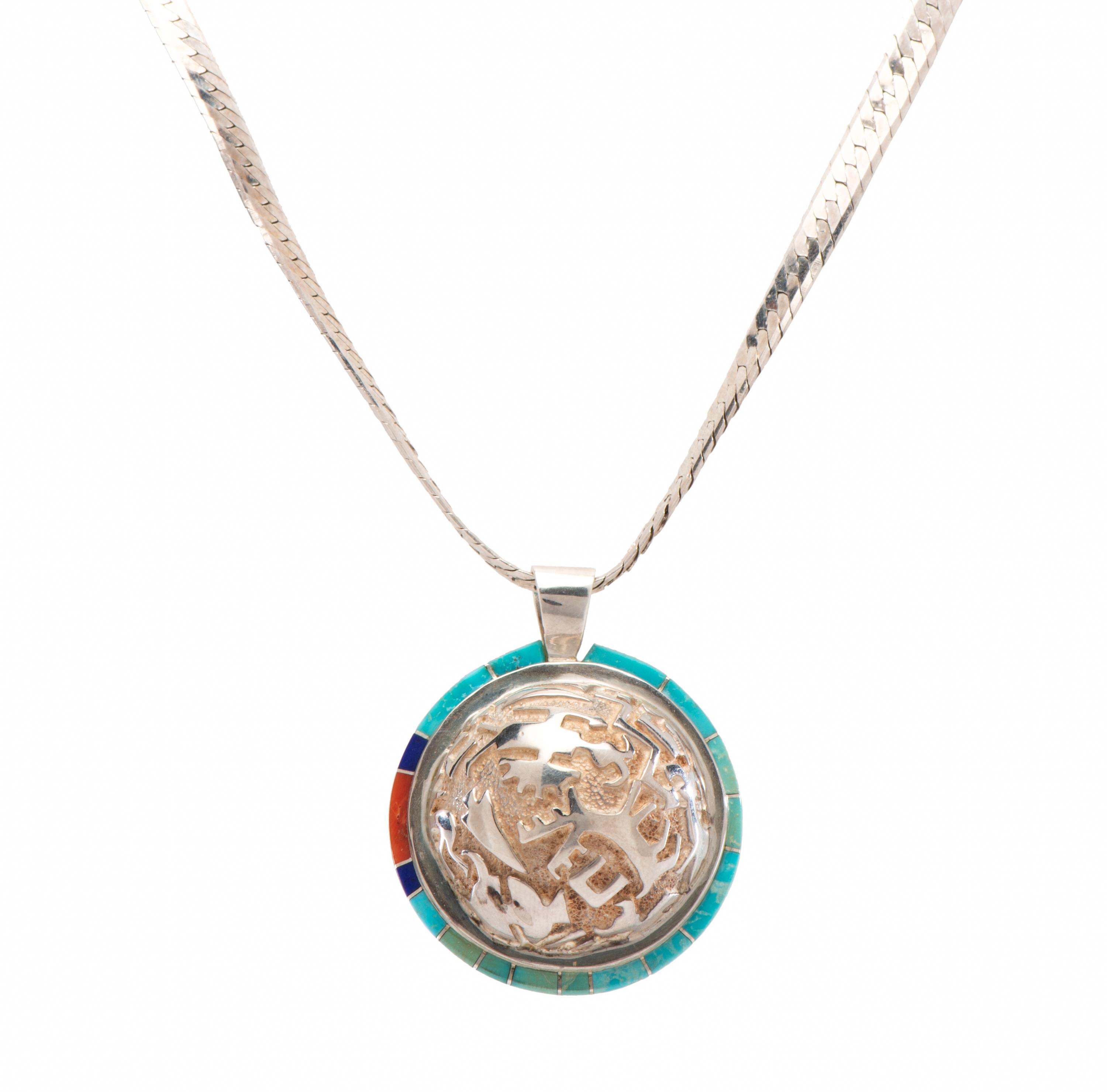 Cast Silver Pendant, with Petroglyph Design and Turquoise, Lapis, and Coral Inlay Lot is located and will ship from Denver, Colorado.