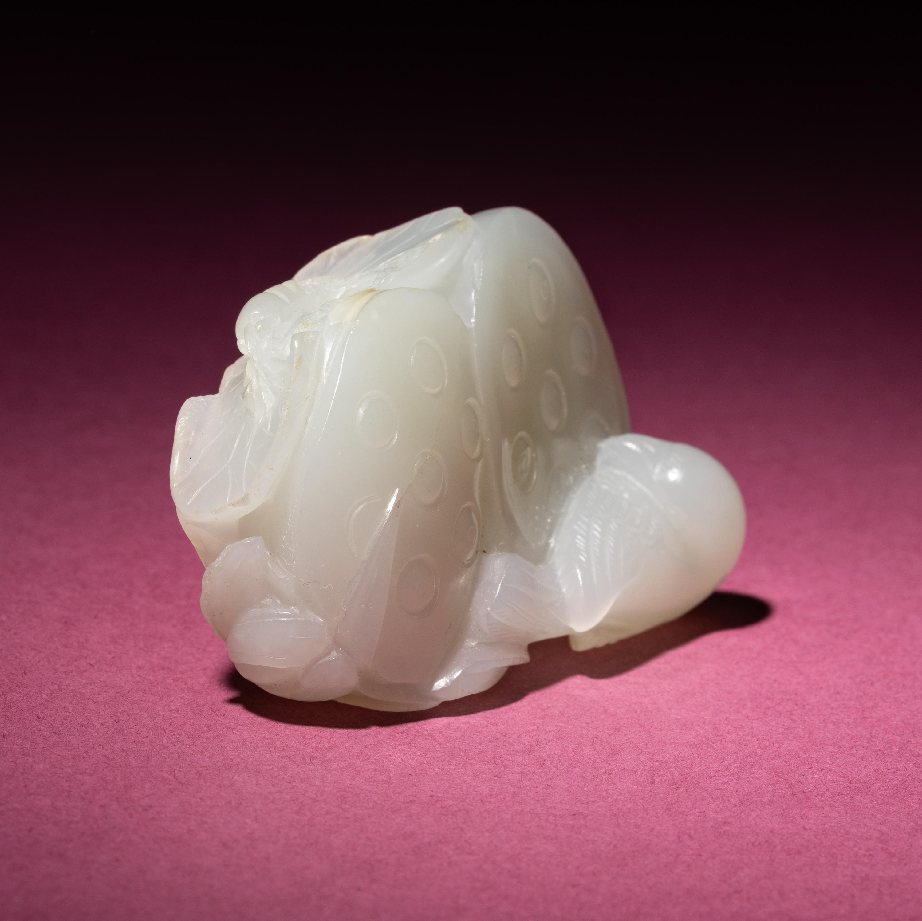 A Chinese White Jade Carving of Double Lotus Pods, 18th/19th Century — 清中期 白玉雙蓮子把件