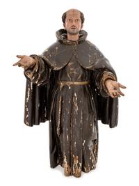 A Continental Painted Figure of Saint Francis