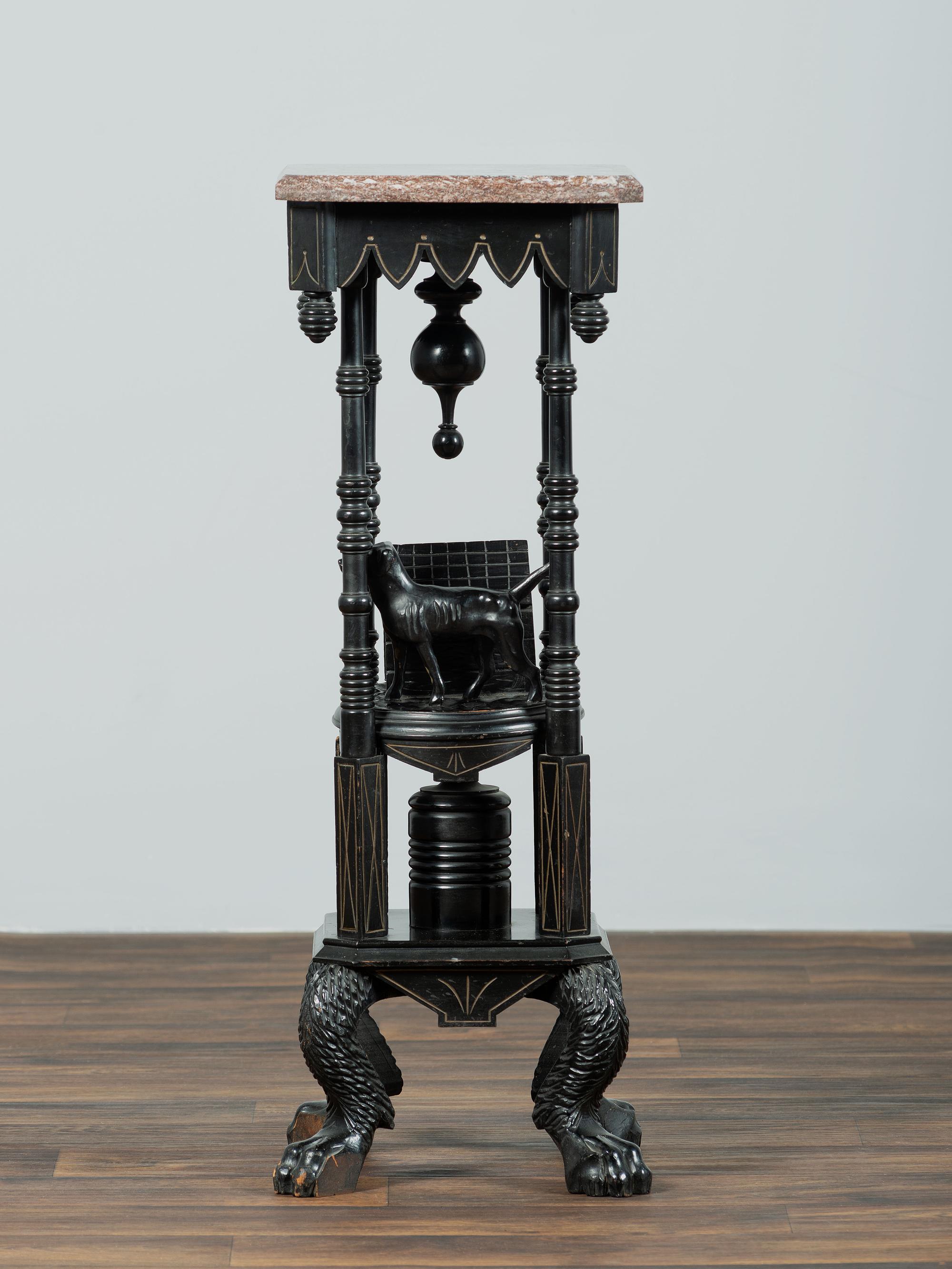 A Victorian Marble-Top Carved and Ebonized Parlor Table with Dog