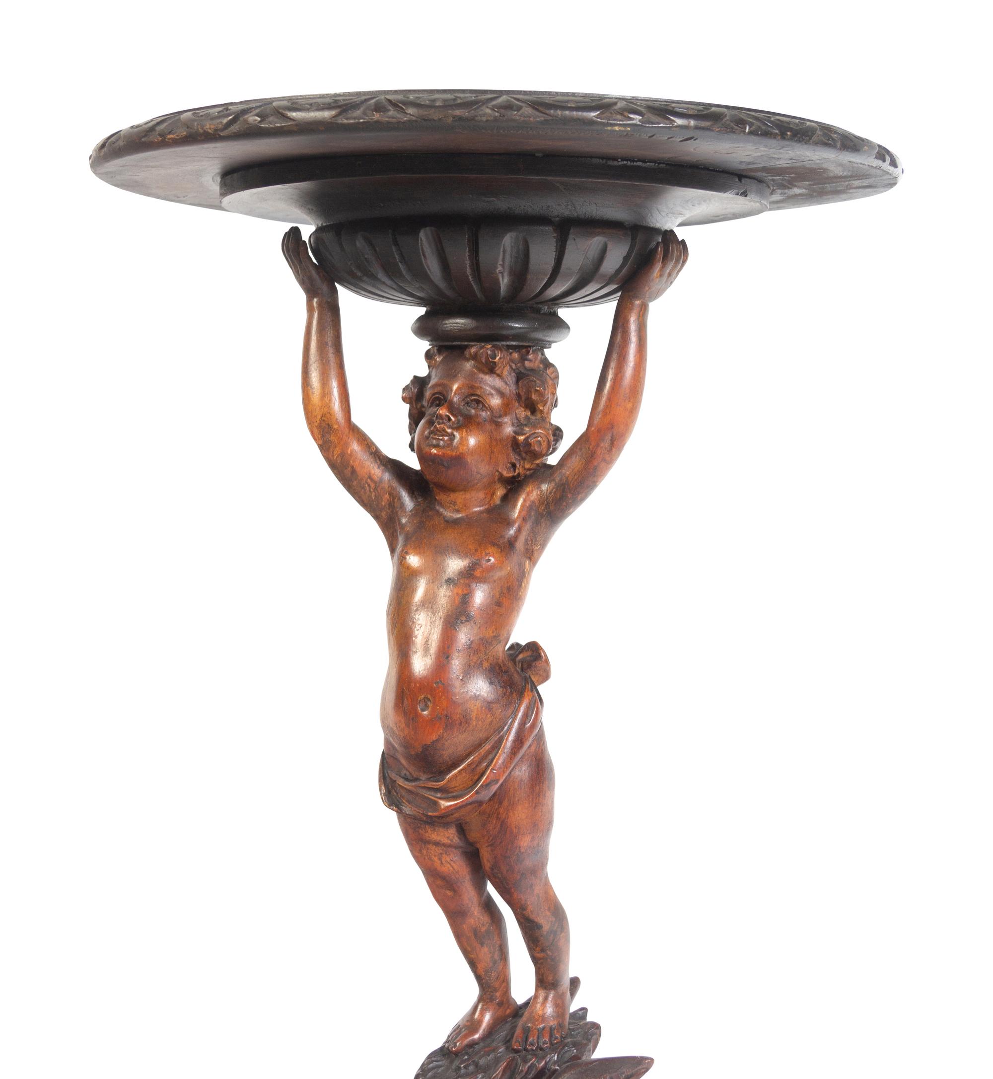 A Venetian Carved Walnut Figural Table
