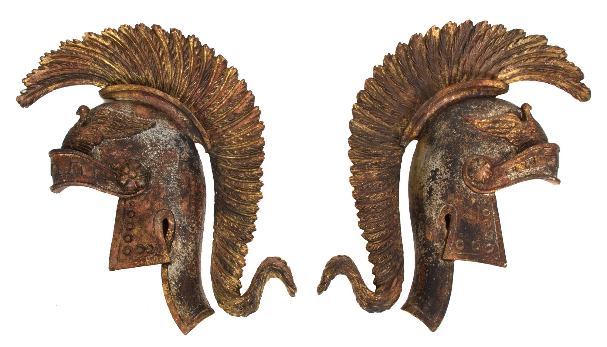 A Pair of Italian Parcel Gilt Carved Wood Helmet-Form Wall Plaques Height 18 1/4 inches. — 20TH CENTURY