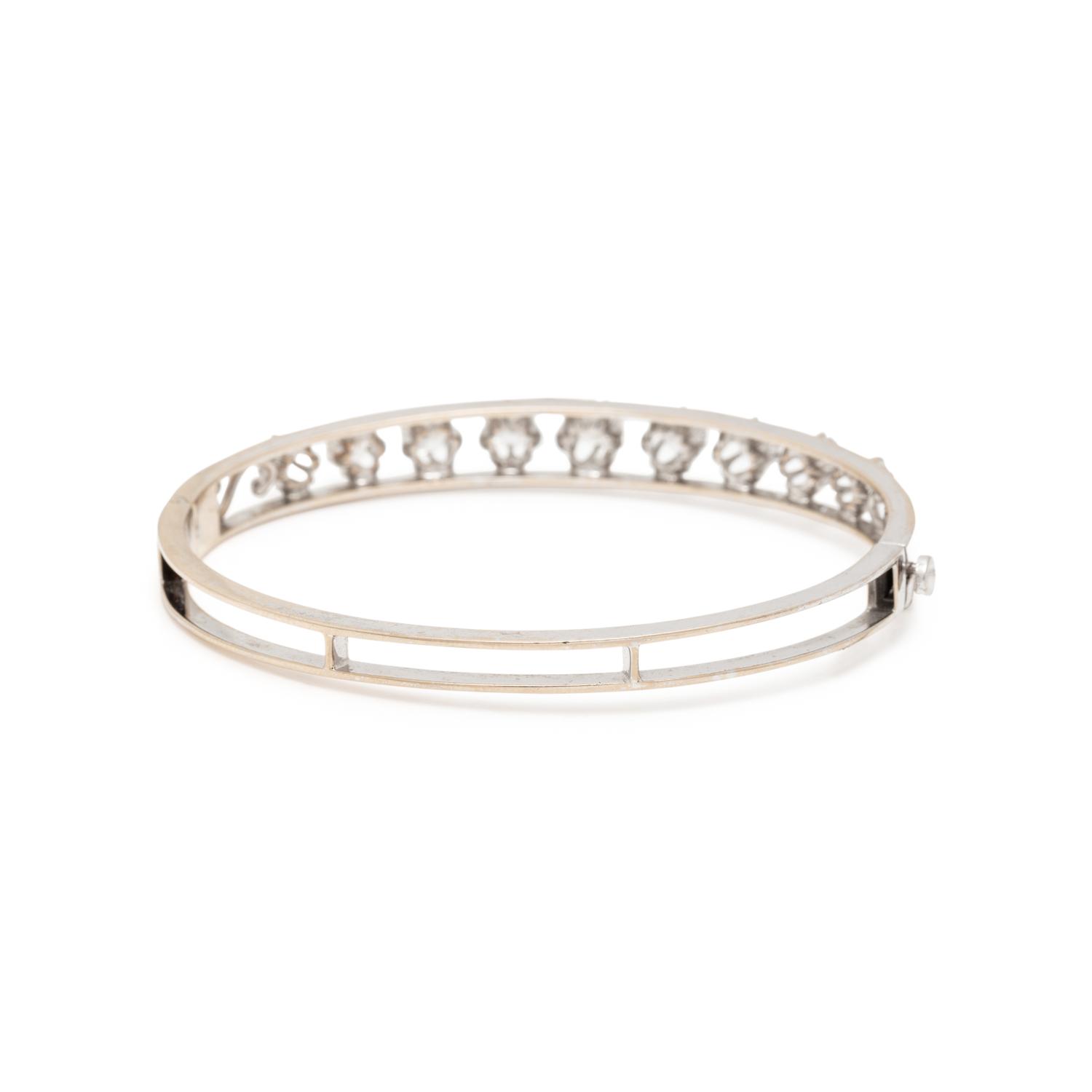 WHITE GOLD AND DIAMOND BANGLE BRACELET