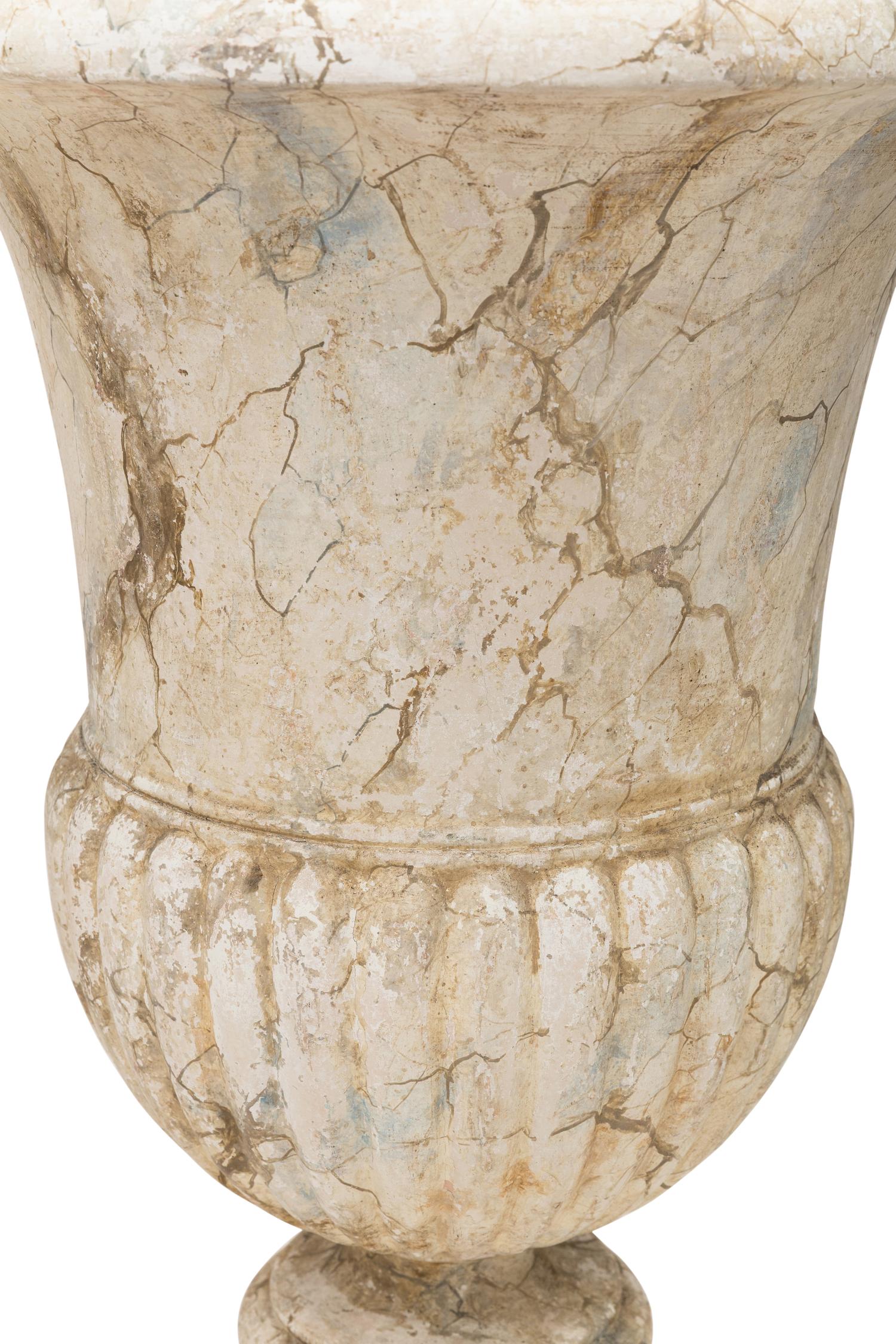 A Pair of Large Painted Faux Marble Urns