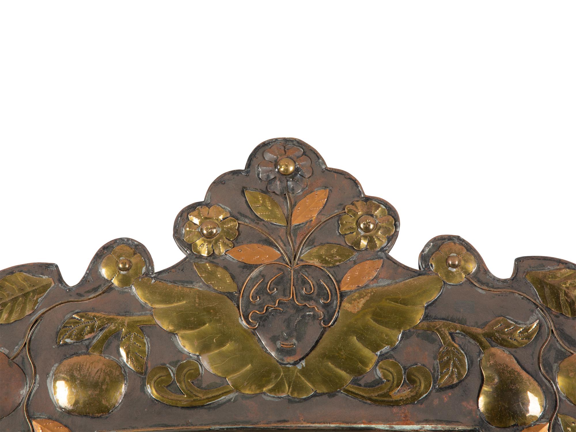 A Continental Brass and Copper Framed Mirror — 20th Century