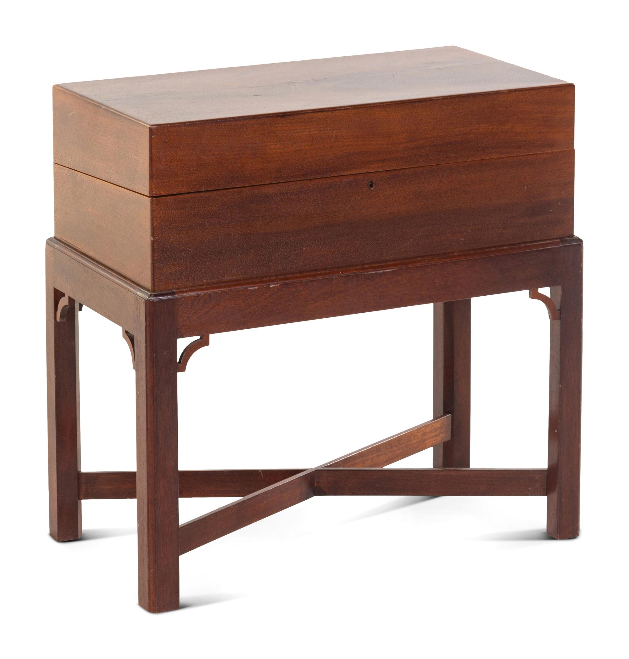 A Chippendale Figured Mahogany and Satinwood Lap Desk on Stand