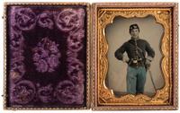 Quarter plate tintype of bugler Charles Raymond, Company D, 2nd Ohio Cavalry.