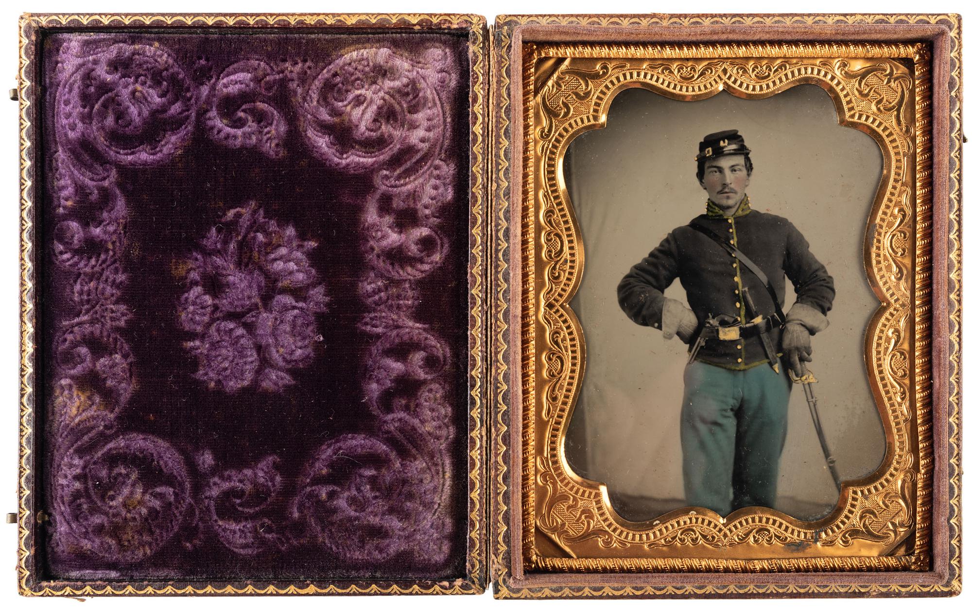 Quarter plate tintype of bugler Charles Raymond, Company D, 2nd Ohio Cavalry.