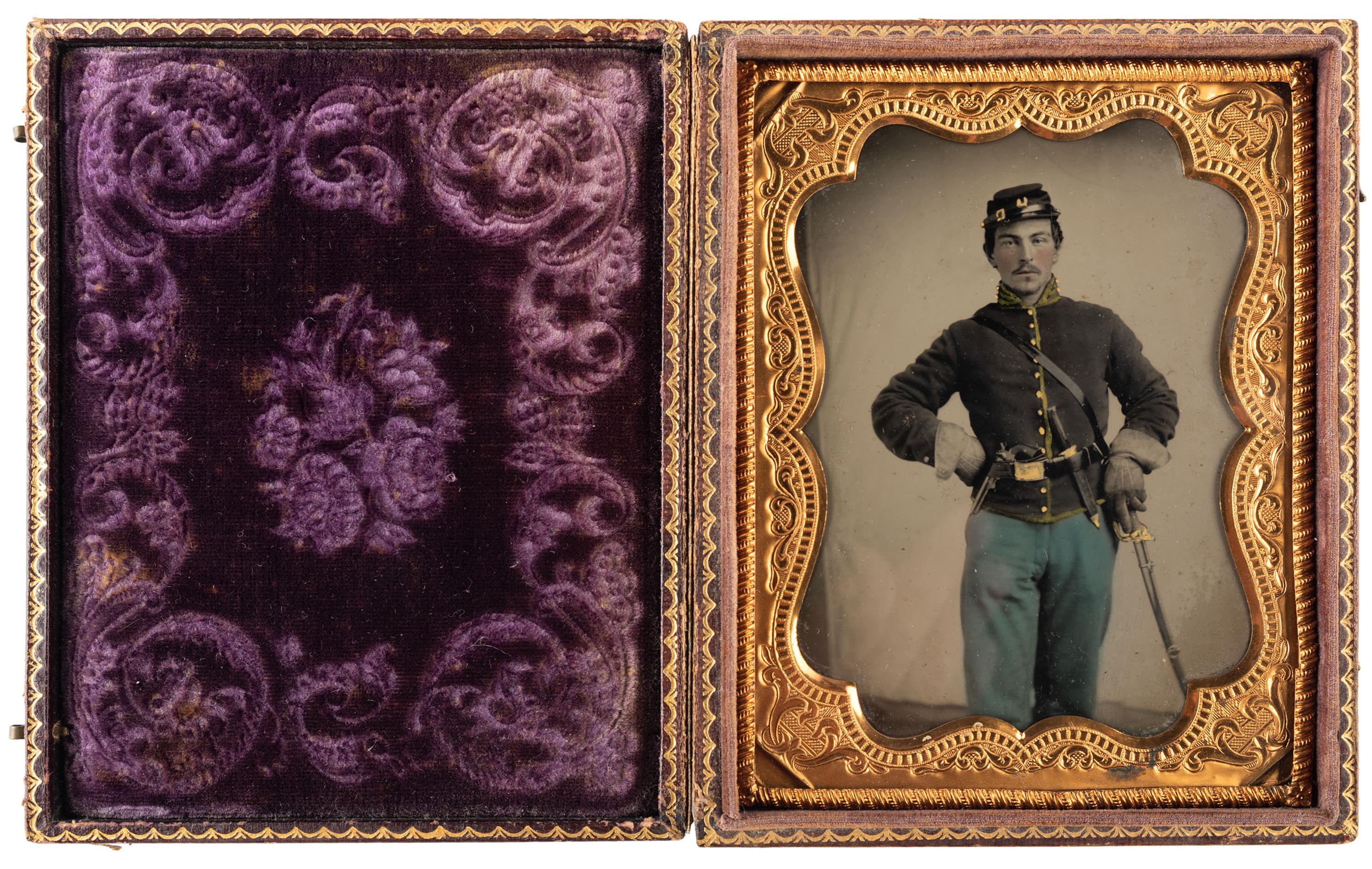 Quarter plate tintype of bugler Charles Raymond, Company D, 2nd Ohio Cavalry.