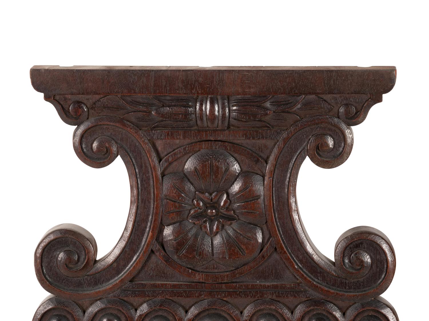 A Pair of Renaissance Revival Carved Walnut Urn-Form Panels