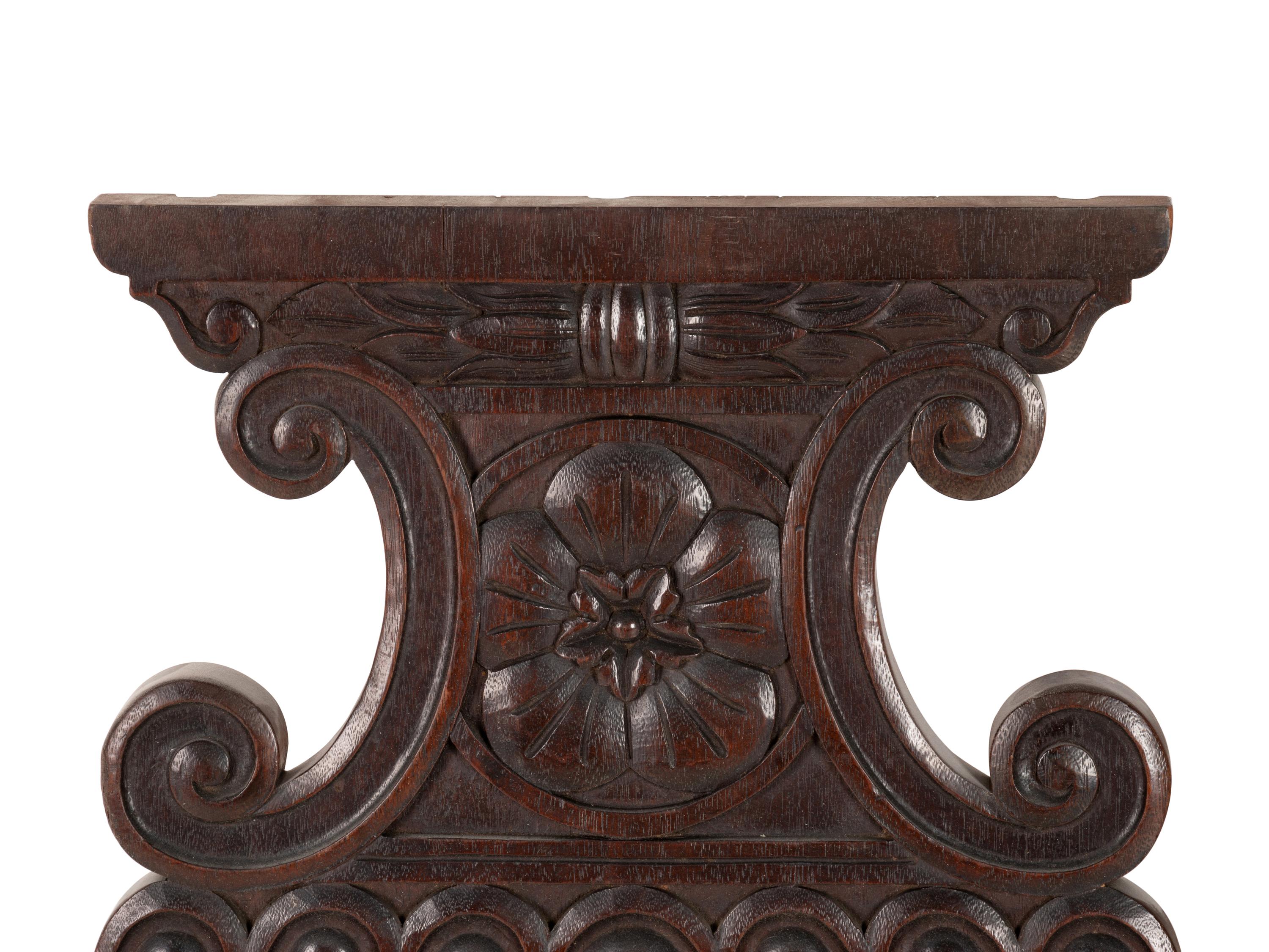 A Pair of Renaissance Revival Carved Walnut Urn-Form Panels