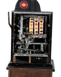 A 5 Cent Rol-A-Top Twin Jackpot Slot Machine on Reverse Printed Glass Inset Golden Nugget Stand