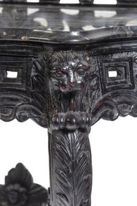 An Anglo-Indian Carved and Ebonized Console Table