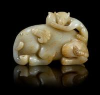 A Carved Jade Toggle Length 2 3/4 inches.